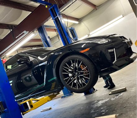 Mechanic performing an oil change
